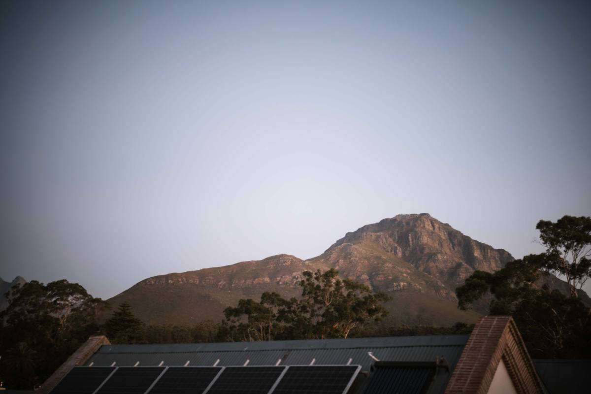 View of the Stellenbosch mountains at dusk above the studio rooftop.